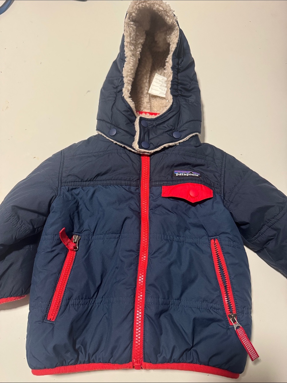 Patagonia Navy and Red Kids Puffer Jacket with Sherpa Hood